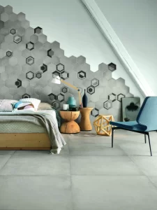 Qui una soluzione con piastrelle in camera da letto